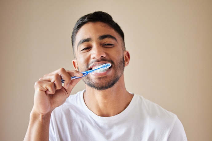The Right Way to Brush Your Teeth, According to a Dentist
