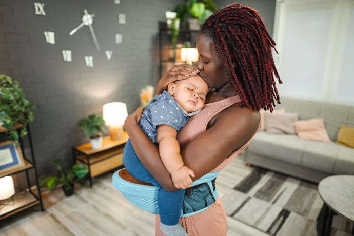 When to Get a Hip Seat Versus a Baby Carrier