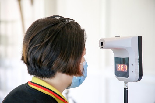 Alcohol Dispenser With Thermometer Lets You Monitor Your Temperature Easily