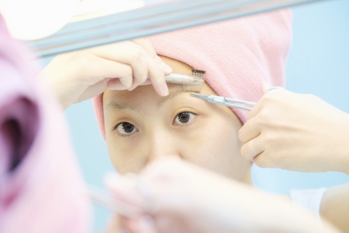 A Pair of Scissors Come in Handy When Trimming Overgrown Hair