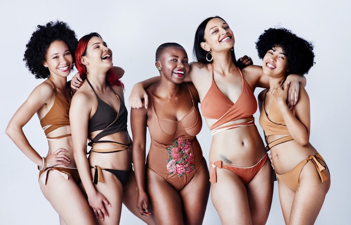 Asymmetrical Suits Offer the Right Amount of Support and Coverage for Curvy Women