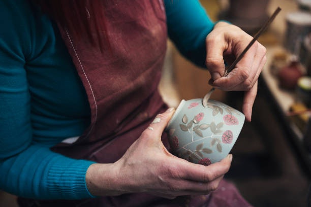 Customize Your Clay Pot by Hand Painting Them Using Paint Pots
