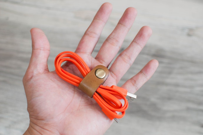 For Single Cables and Thin Wires, a Velcro, Magnetic, or Snap Button Cable Organizer is Recommended