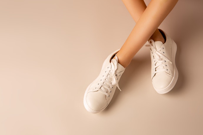 For Both Casual and Formal Wear, Opt for Low-Cut White Sneakers