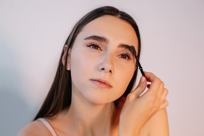 Use a Brow Brush or Spoolie Brush to Tame Stray Hairs
