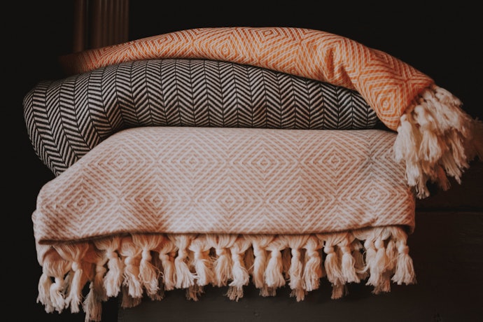 For a Breathable and Highly Absorbent Blanket, Opt for Cotton