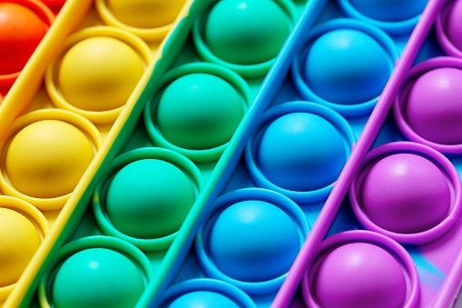 Select Pop-Its With a High Bubble Count to Minimize Flipping and Maximize Play