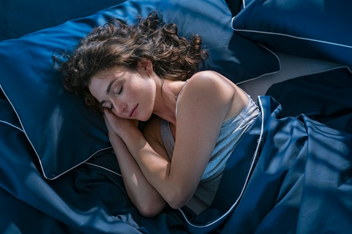 Match Mattress Firmness to Your Weight and Sleep Position for Proper Spinal Support