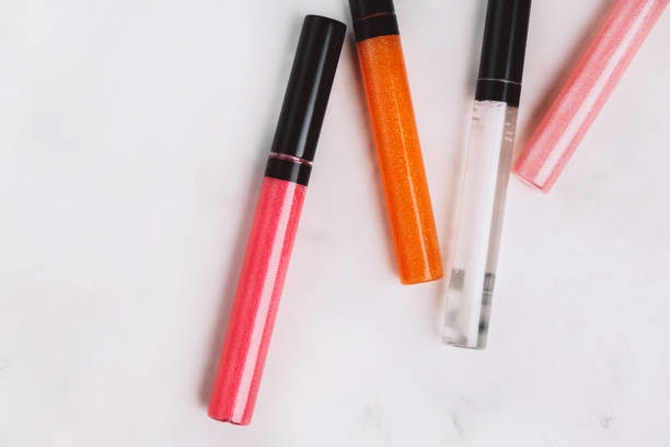 Choose Between Clear or Tinted Gloss for Your Desired Look