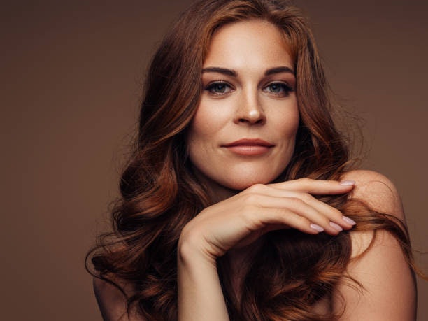 Choose Universal Shades Like Chestnut Brown or Soft Auburn That Flatter Neutral Skin Best
