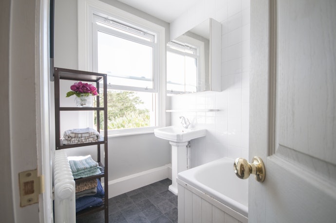 Consider Metal Racks and Toilet Shelves for Additional Storage Space