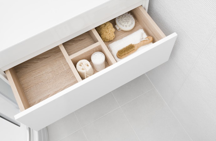 Use Trays to Categorize Small Items in Your Drawers
