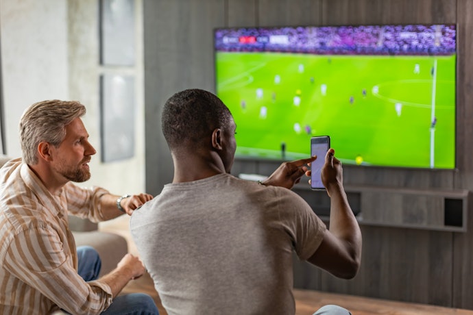 Opt for QLED for Brighter Colors in Well-Lit Rooms; LED for Affordability