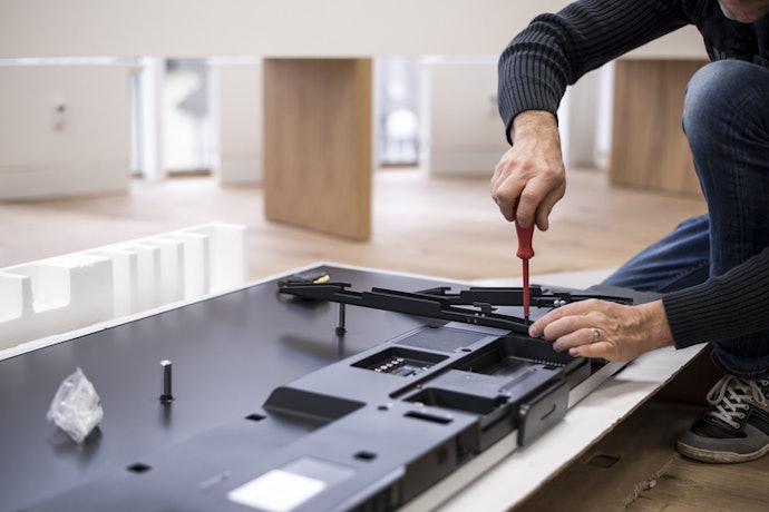 Check If the TV Is VESA-Compatible for Wall Mounting
