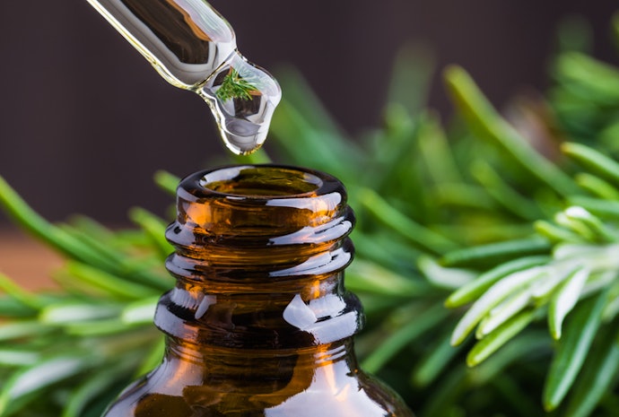 Achieve Longer and Thicker Hair With Rosemary Oil