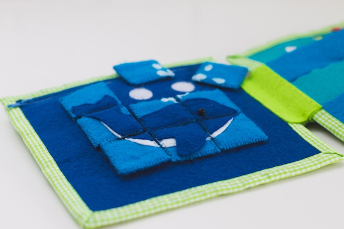 6-12 Months: Go for Interactive Elements to Improve Hand-Eye Coordination