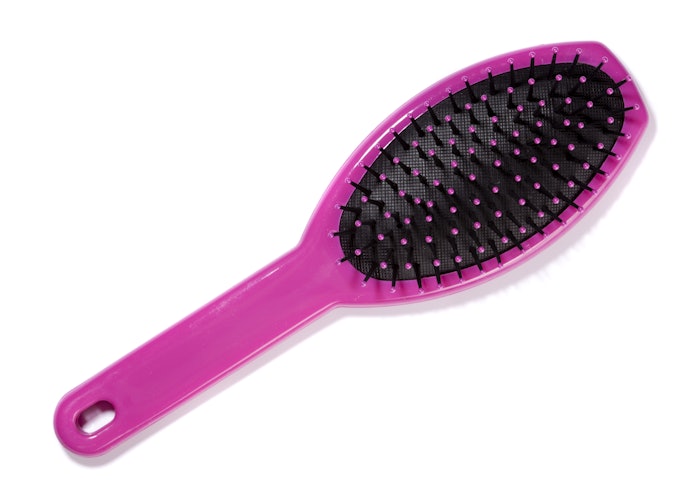 A Cushion Brush Adds Shine to Your Tresses