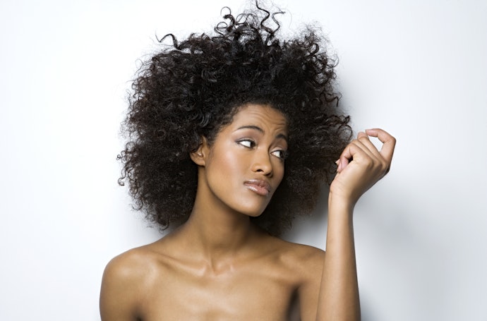 Silicones Cause Build-Up That Weighs Curls Down