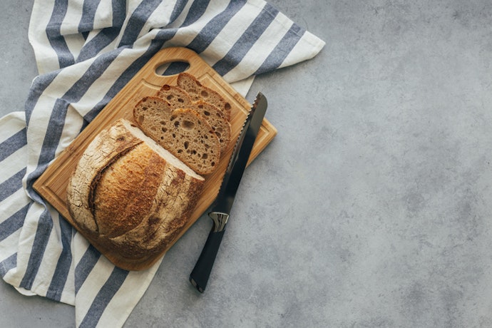 Use Breadboards for Slicing Loaves and Baguettes