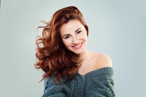 Try Muted Reds or Mauves for a Bold Yet Flattering Style