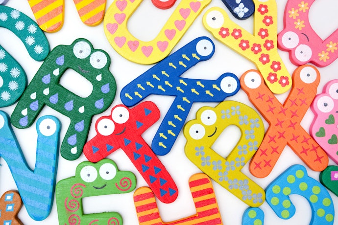 Wooden Toy Puzzles That Teach the Alphabet and Numbers