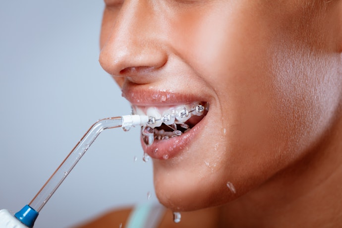 A Water Flosser With Different Pressure Settings Can Be Used by the Whole Family