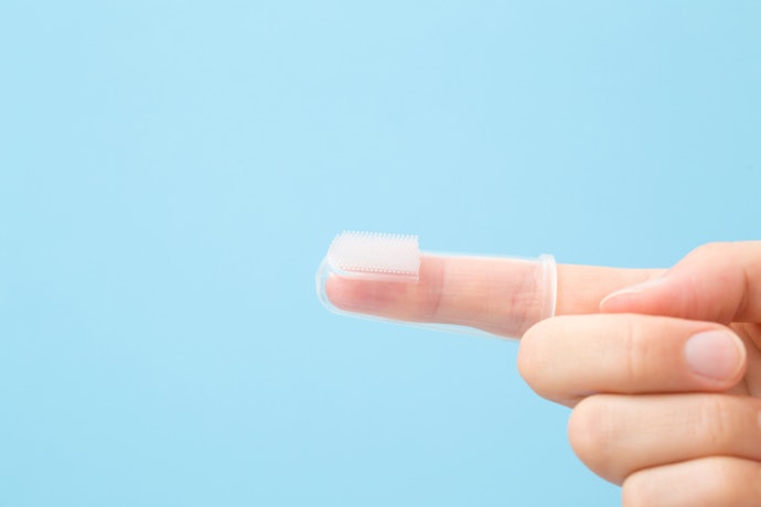 For 0–6 Months: Use Silicone Finger Toothbrushes or Gum Massagers