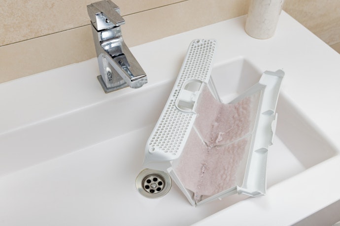 Look for Easy-to-Clean Lint Filters and Tub Interiors