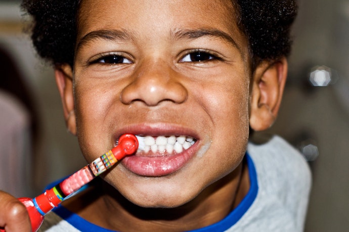 A Brush With a Small Head and Soft Bristles Gently Removes Debris From Your Little One’s Mouth