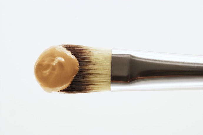 For Liquid or Cream Foundation: Use a Dense Flat or Buffing Brush for Full, Even Coverage