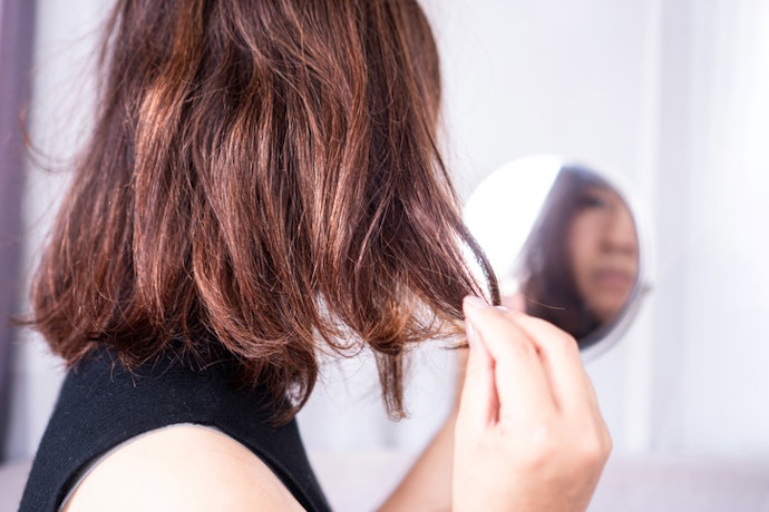 To Tame Frizz and Flyaways, Use Anti-Static or Smoothing Mists