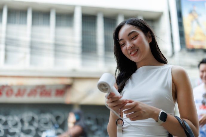 For Daily Commuting and Travel: Go for Compact Handheld Fans