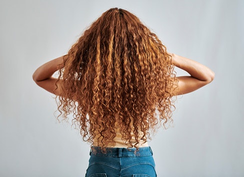 Curly or Wavy Hair: Go With a Moisturizing and Curl-Enhancing Mousse to Define Your Natural Hair